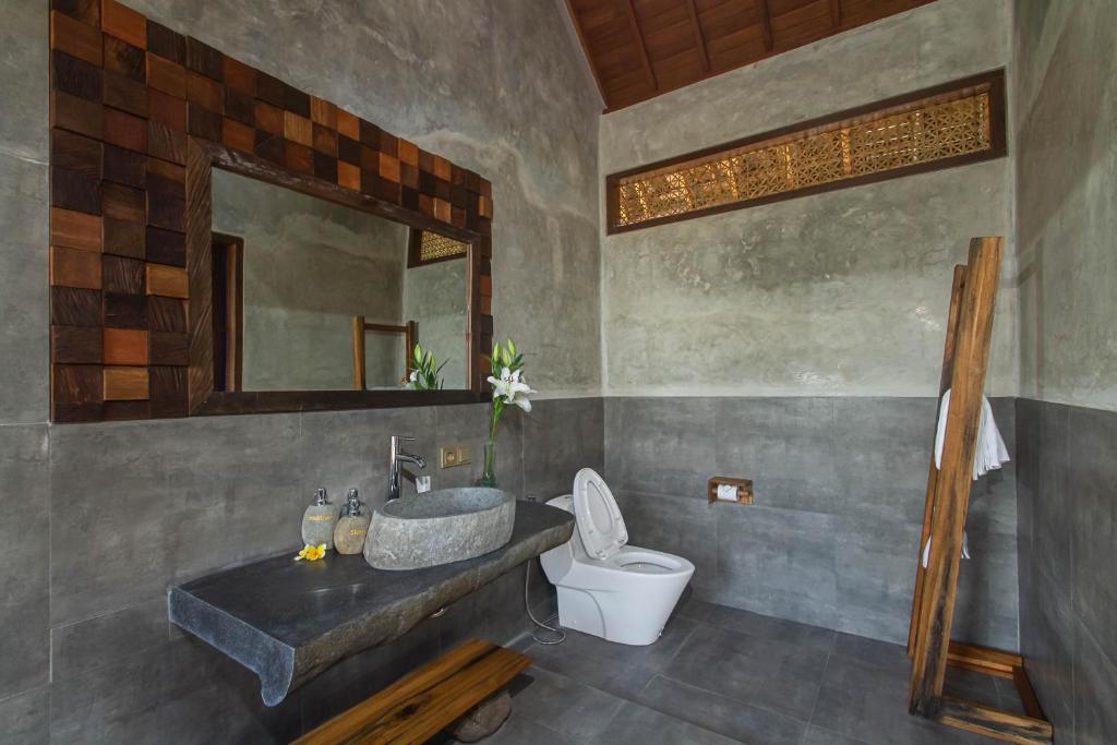 Koupelna v ubytování Ubud Luwih Nature Retreat