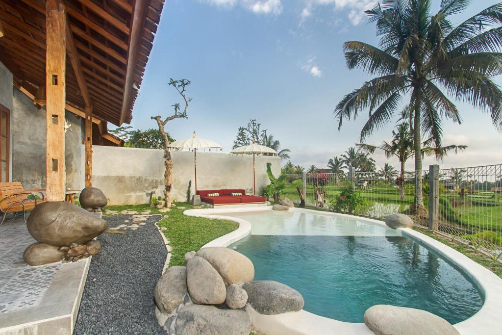Bazén v ubytování Ubud Luwih Nature Retreat nebo v jeho okolí