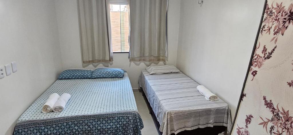 Postel nebo postele na pokoji v ubytování Cantinho do Atalaia à 650 metros da praia - Seu conforto fora de casa