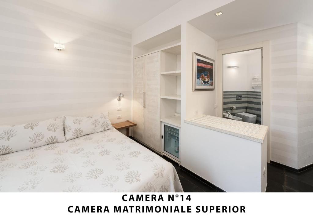 Posteľ alebo postele v izbe v ubytovaní I Tibei Guesthouse Affittacamere