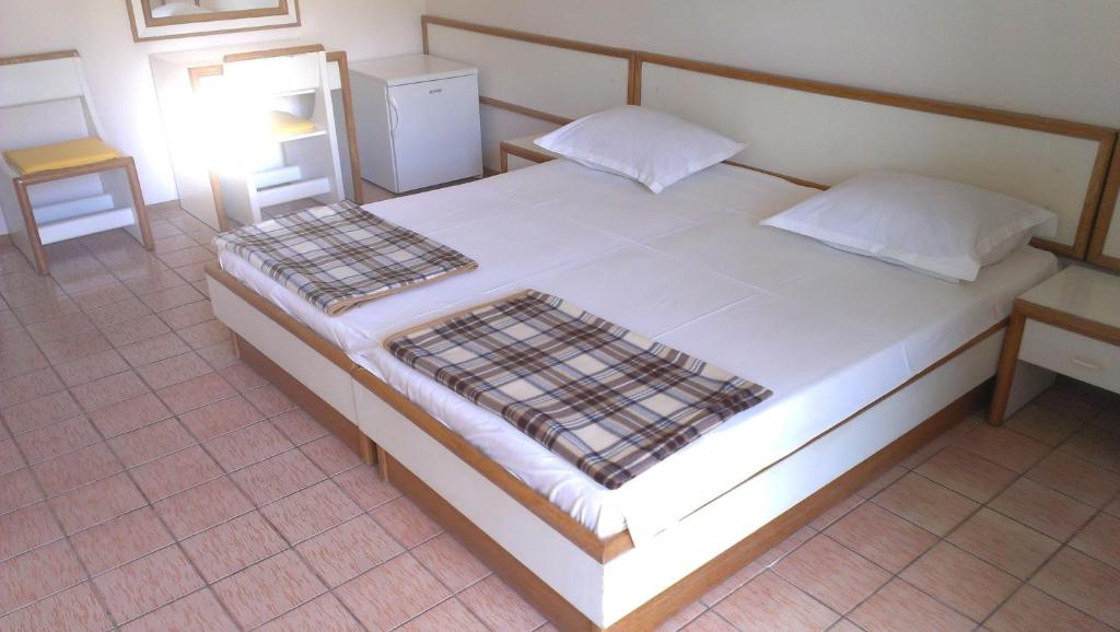 Postel nebo postele na pokoji v ubytování Villa Michel