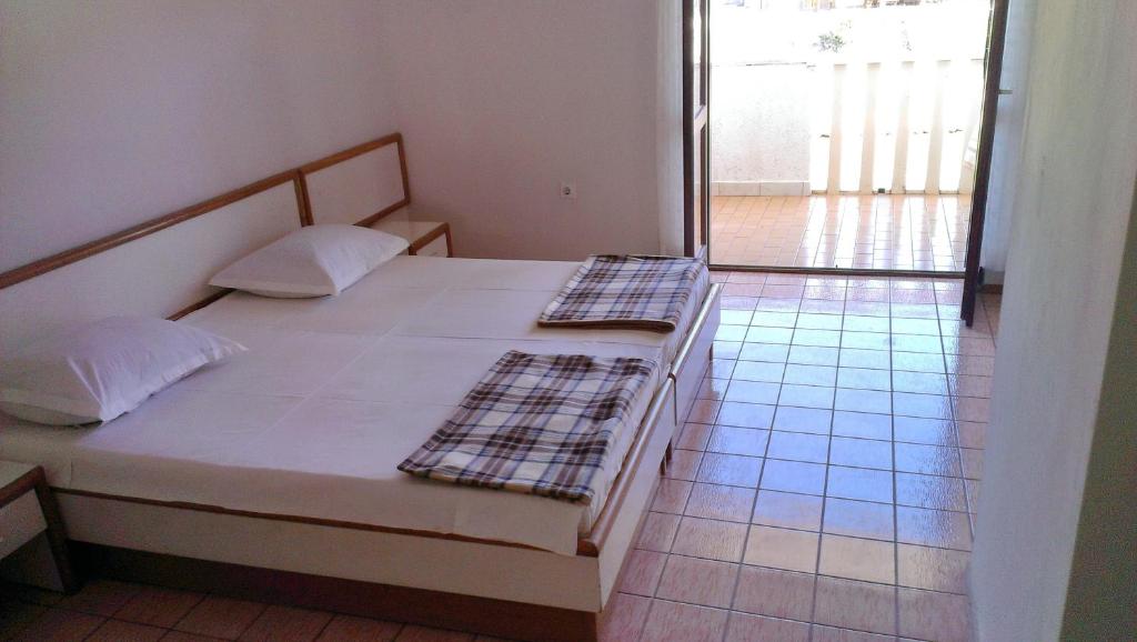 Postel nebo postele na pokoji v ubytování Villa Michel