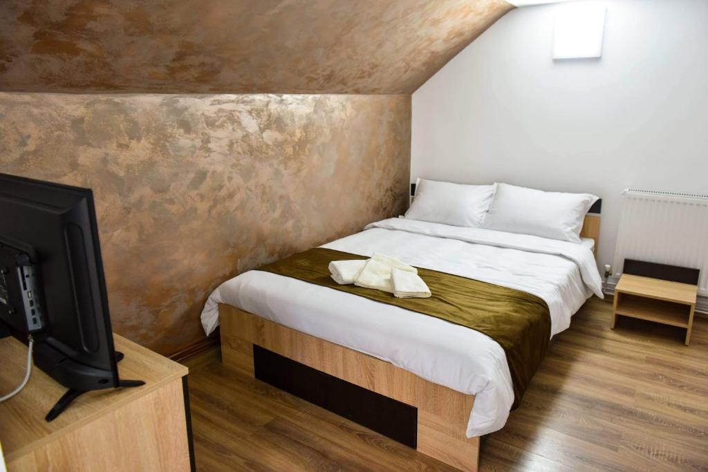 Letto o letti in una camera di UpForest Guesthouse