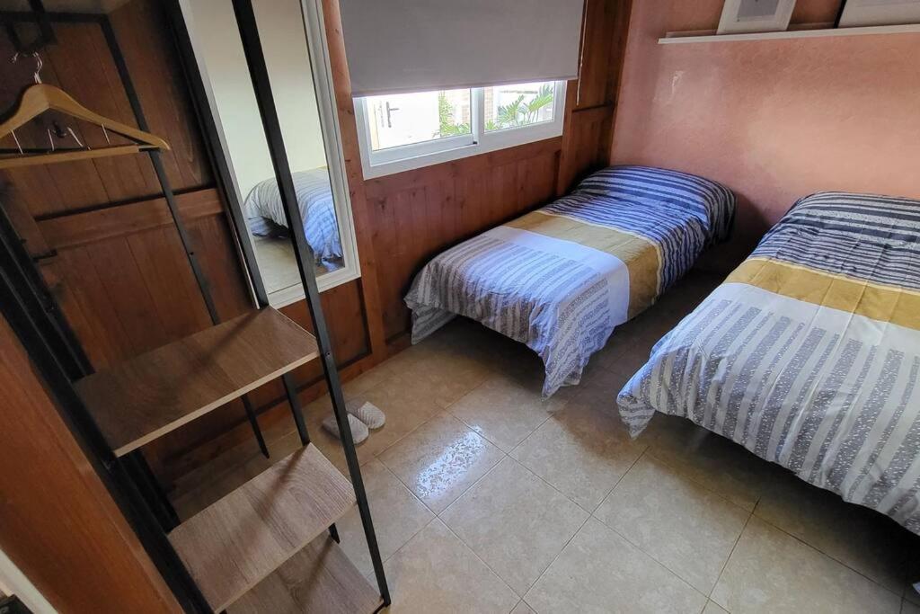 Posteľ alebo postele v izbe v ubytovaní Vintage & Deluxe Apartments