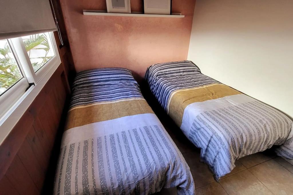 Posteľ alebo postele v izbe v ubytovaní Vintage & Deluxe Apartments