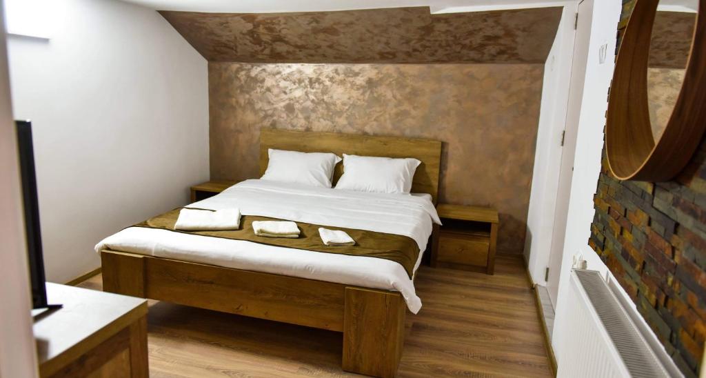 Letto o letti in una camera di UpForest Guesthouse