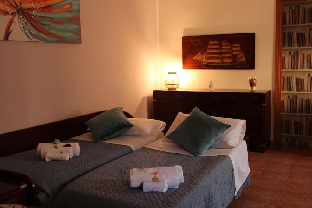 Säng eller sängar i ett rum på (central-home) Marine House-Casa Marina