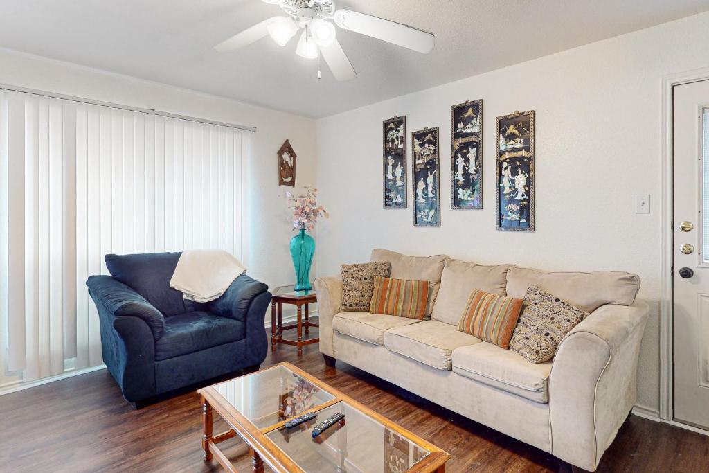 a living room with a couch and a chair at Killeen Apartments, Multiple Units in Killeen