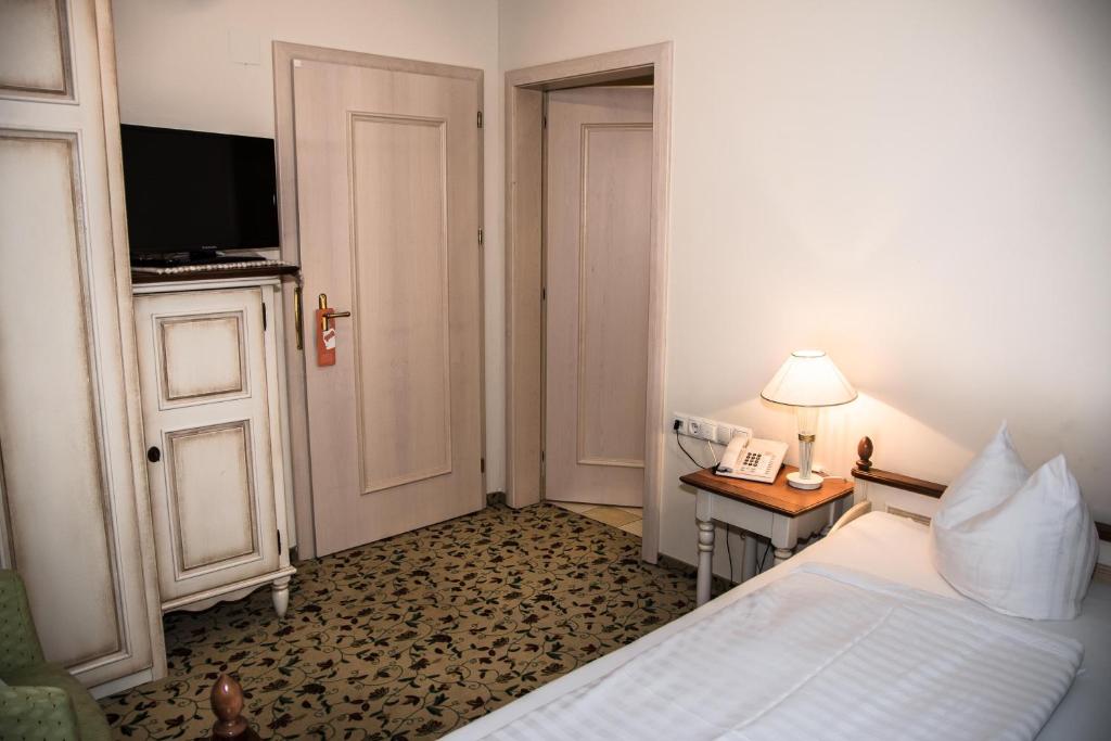 Postel nebo postele na pokoji v ubytování Hotel Daneu Gaschurn