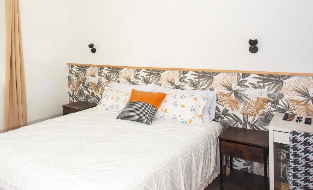 Postel nebo postele na pokoji v ubytování SG ROOMS
