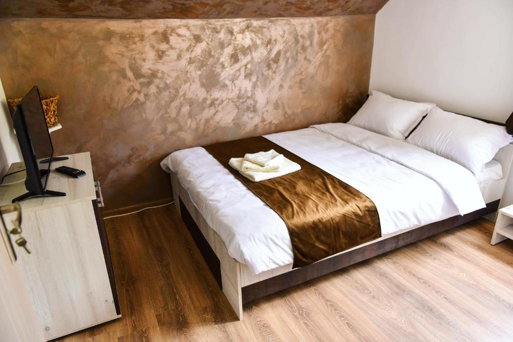 Letto o letti in una camera di UpForest Guesthouse