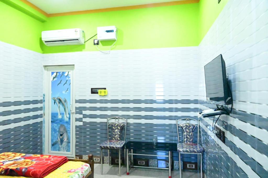 TV a/nebo společenská místnost v ubytování HOLIDAY INN