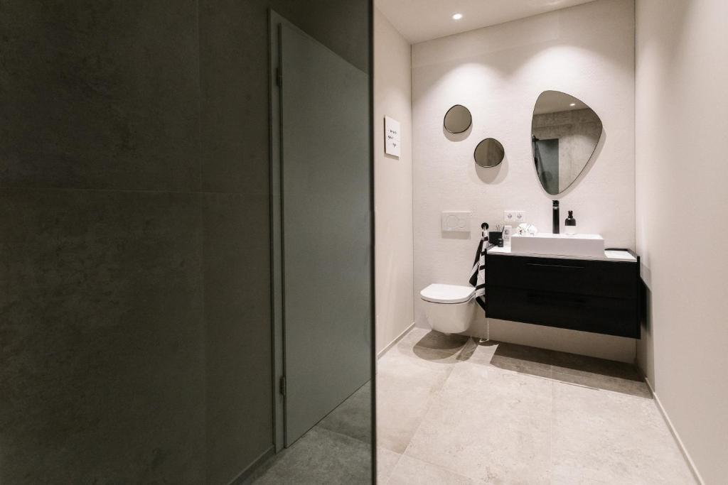 Vonios kambarys apgyvendinimo įstaigoje Exklusive Design Appartement Magnolia Neubau