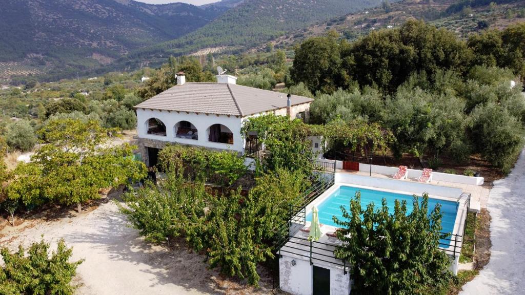 an aerial view of a house with a swimming pool at Casa Jurinea Alzar in Torres