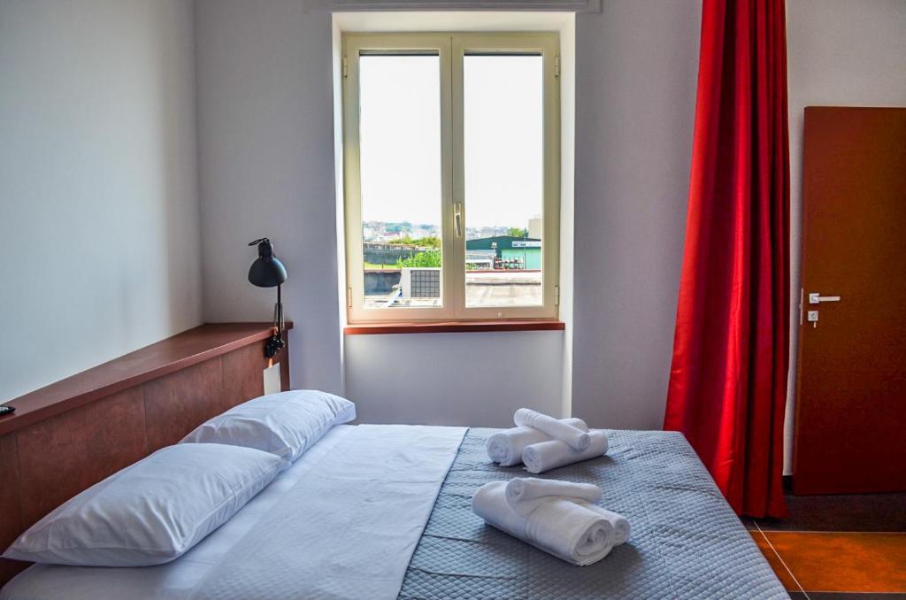 Postel nebo postele na pokoji v ubytování Scavi 32