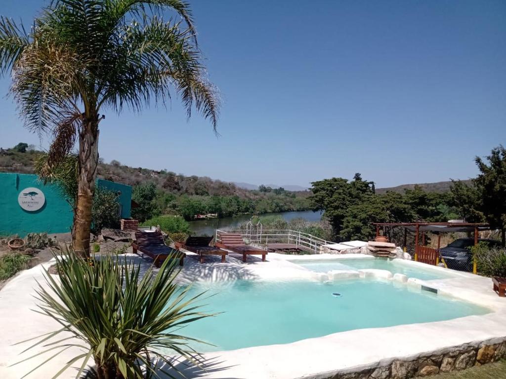 Πισίνα στο ή κοντά στο Las Acacias Refugio