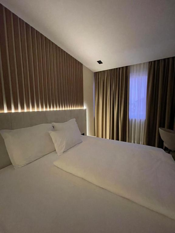 Postel nebo postele na pokoji v ubytování Hotel Kod Barića