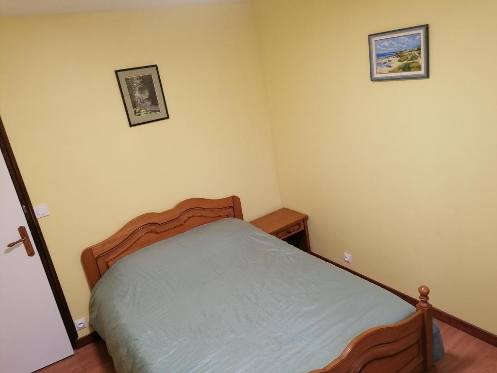 Postel nebo postele na pokoji v ubytování Gîte du canal rue de la Tuilerie