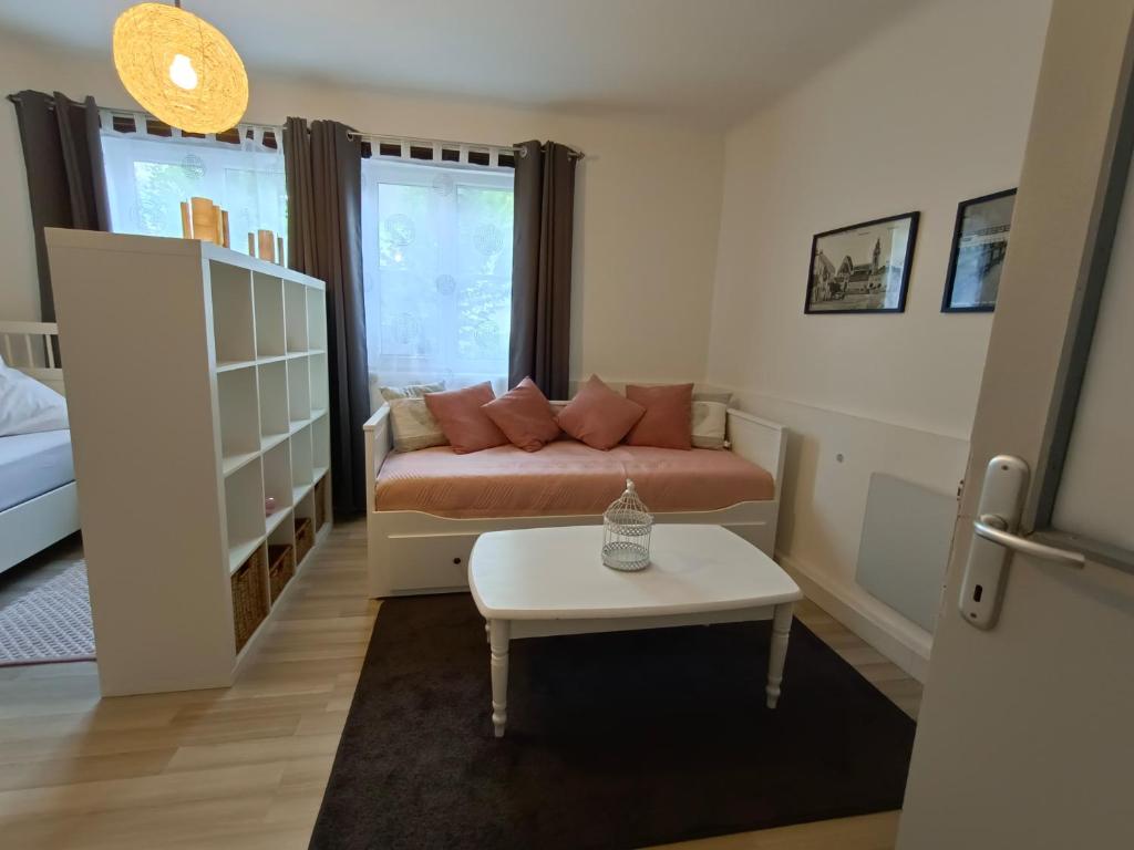 Postel nebo postele na pokoji v ubytování Ferienwohnung Strohblume