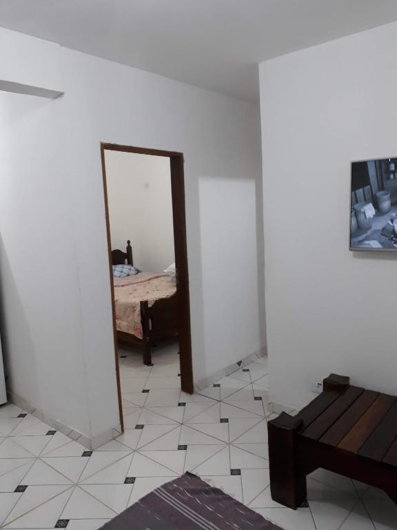 Postel nebo postele na pokoji v ubytování Chalé do Rogério