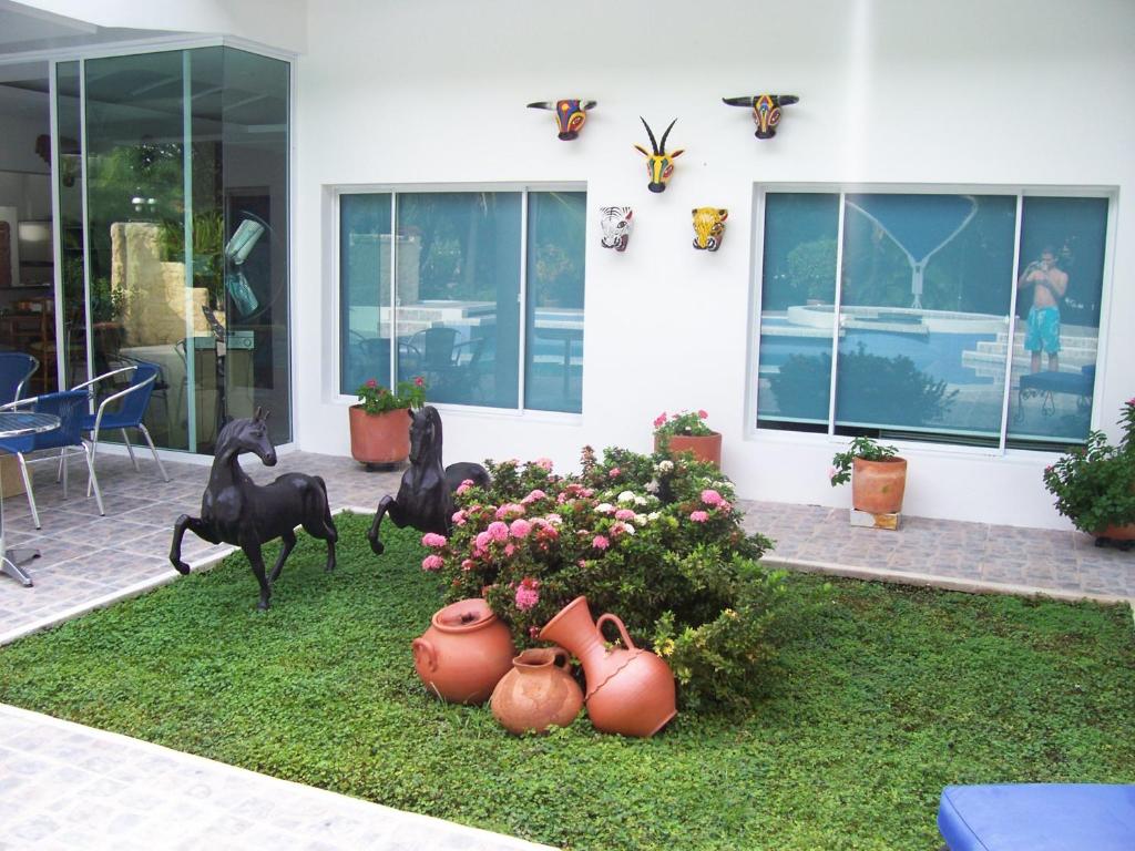 Domácí mazlíčci ubytovaní s hosty v ubytování Casa Campestre El Peñon 5 Habitaciones