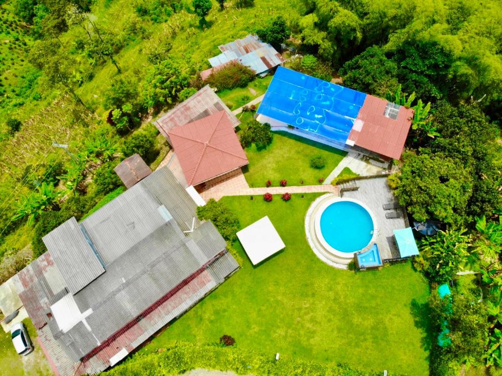 an overhead view of a yard with a pool at Mountain View Hostel in Manizales