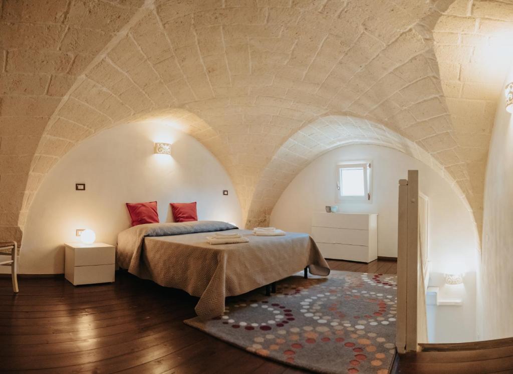 Postel nebo postele na pokoji v ubytování Il Maniero