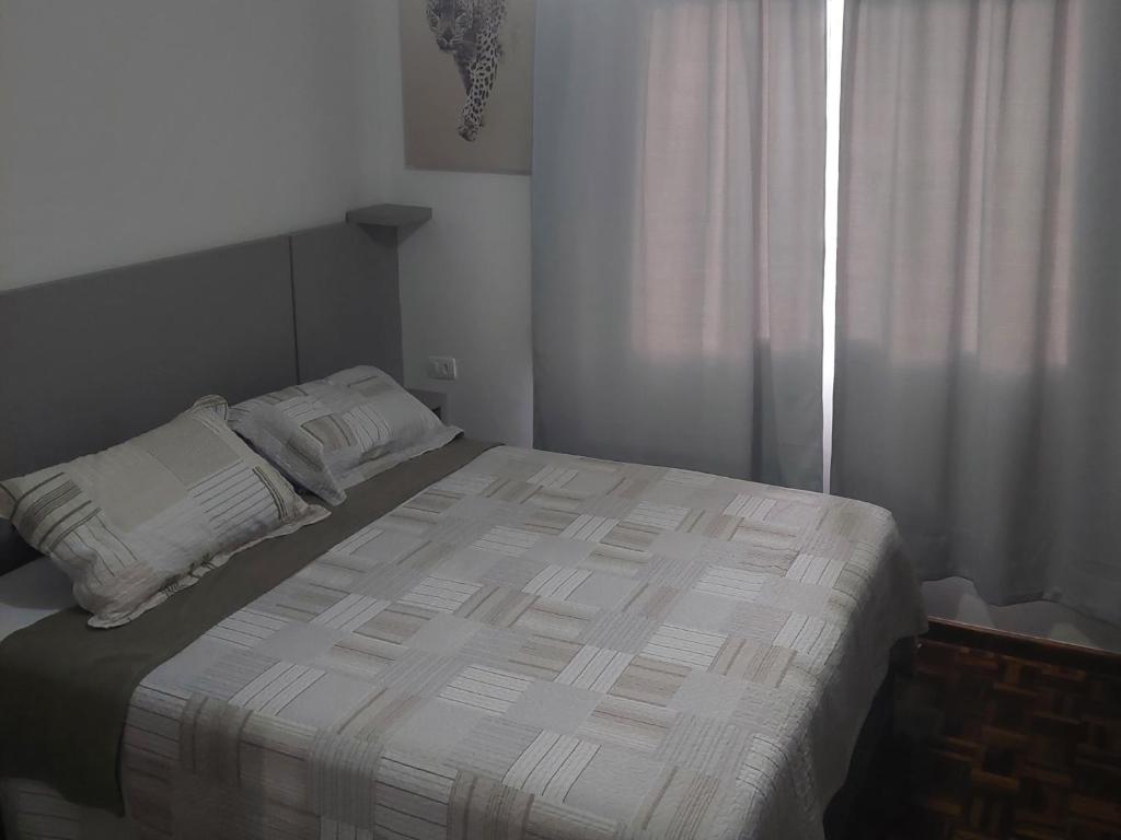 Casa com garagem em condomínio - Casa De Tres Dormitorios