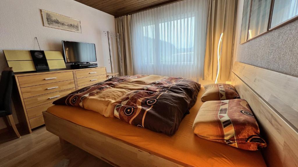Postel nebo postele na pokoji v ubytování Alpenblick Loft neben Skilift in Amden Arvenbüel