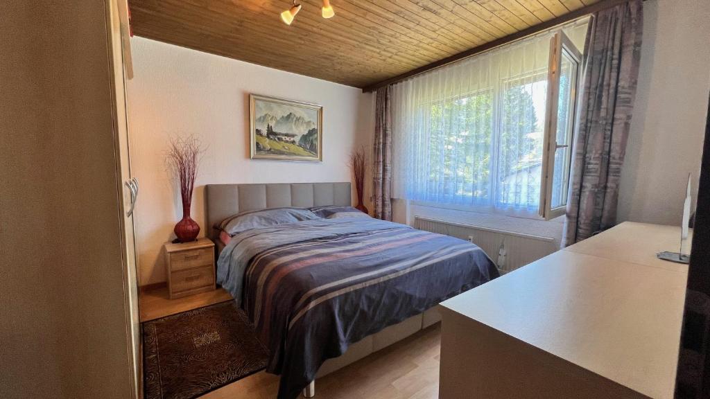 Postel nebo postele na pokoji v ubytování Alpenblick Loft neben Skilift in Amden Arvenbüel