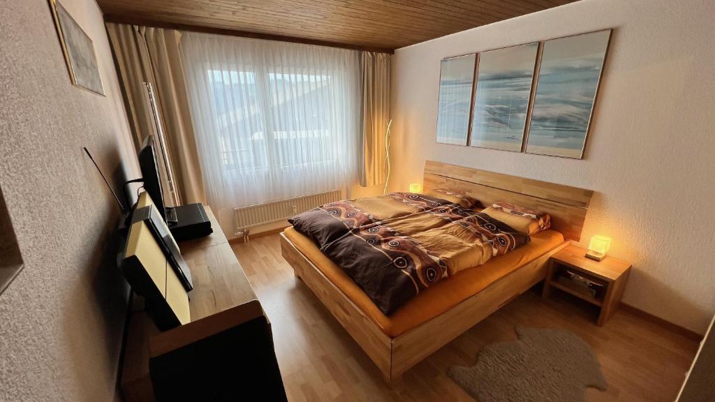Postel nebo postele na pokoji v ubytování Alpenblick Loft neben Skilift in Amden Arvenbüel
