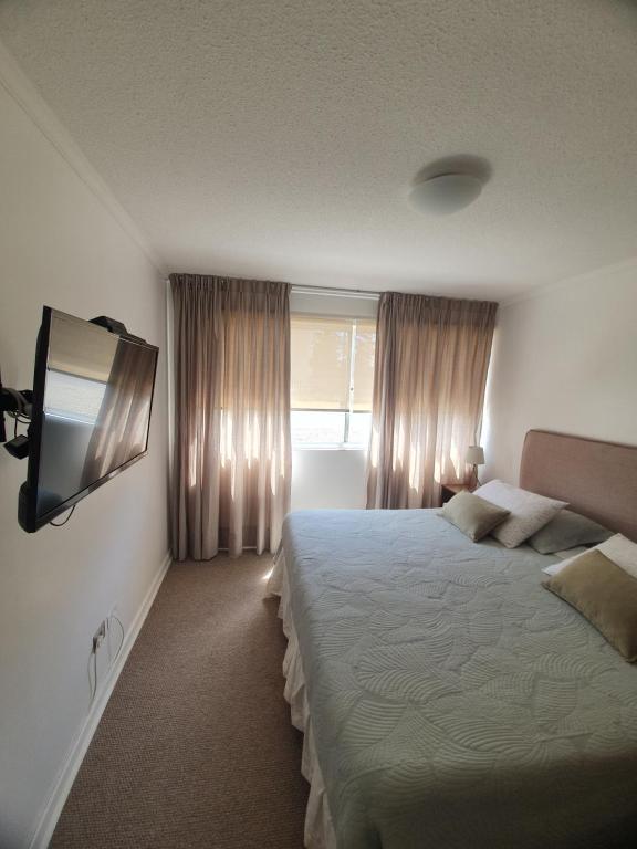 Postel nebo postele na pokoji v ubytování Hermoso Departamento