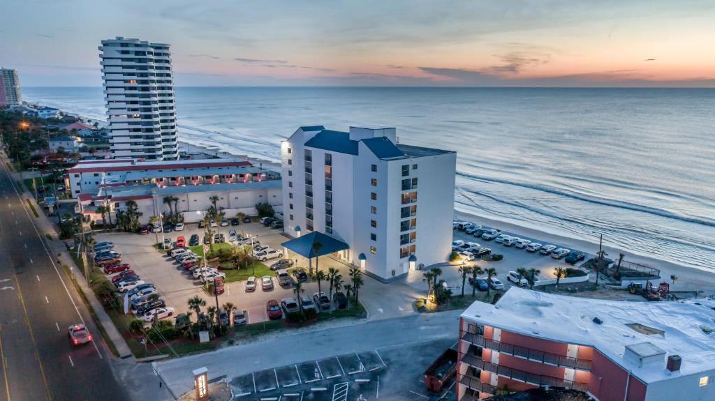 an aerial view of a city and the ocean at Tropical Winds Resort Hotel in Daytona Beach