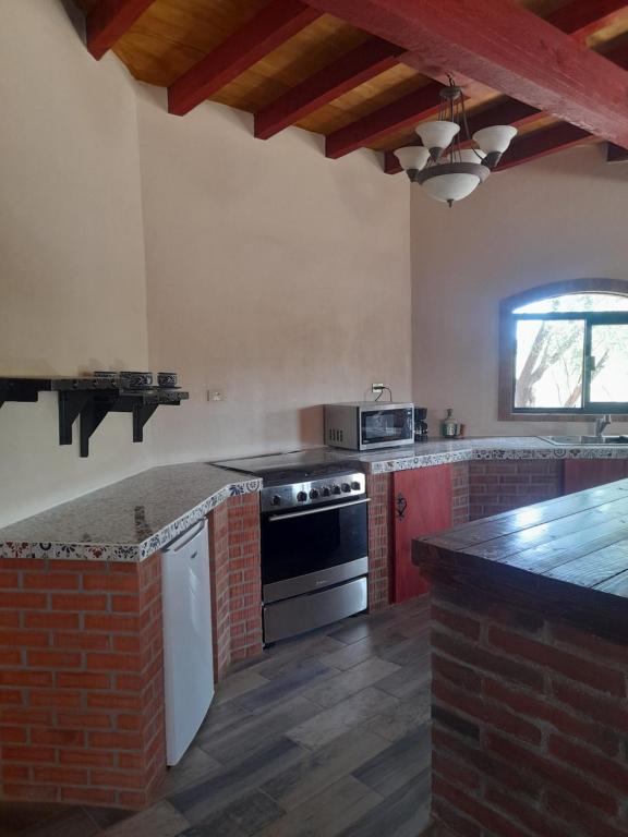Kuchyň nebo kuchyňský kout v ubytování Rancho Espinoza La Casita