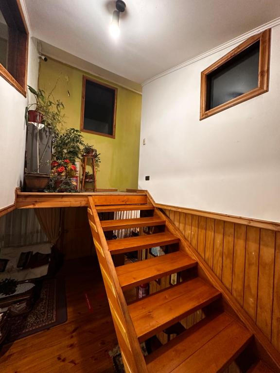 TV a/nebo společenská místnost v ubytování Hostal y Cabañas Mirando al Mar