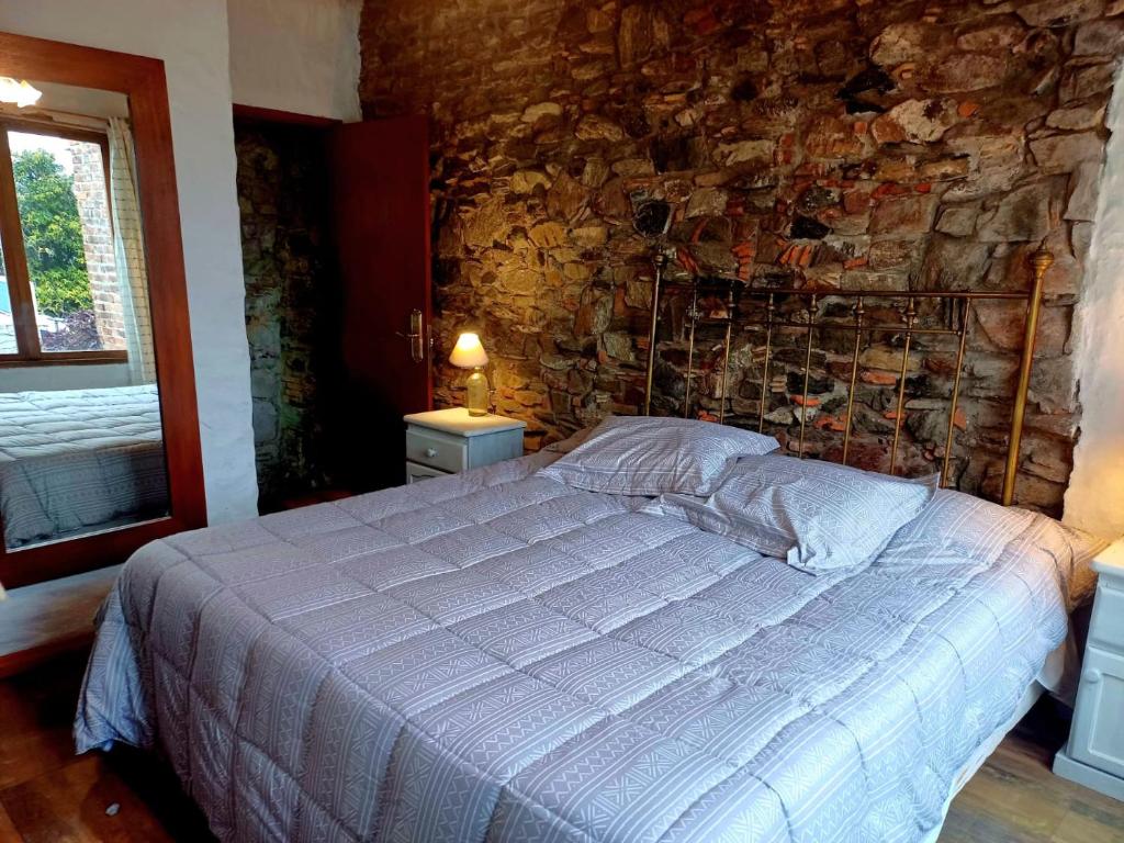 Postel nebo postele na pokoji v ubytování Posada San Gabriel