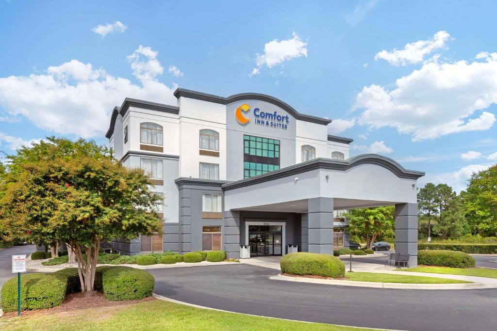 a rendering of a hotel with a building at Comfort Inn & Suites Greenville Near Convention Center in Greenville