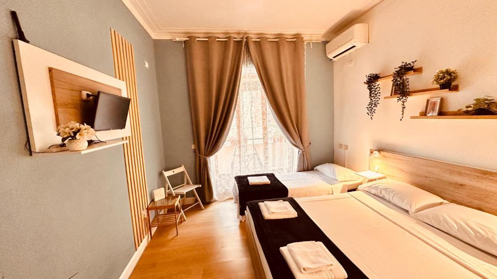 Łóżko lub łóżka w pokoju w obiekcie Pardis Guest house