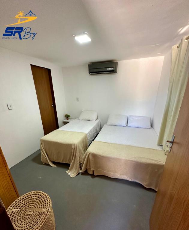 Säng eller sängar i ett rum på SRBG Casa em Barra Grande-PI