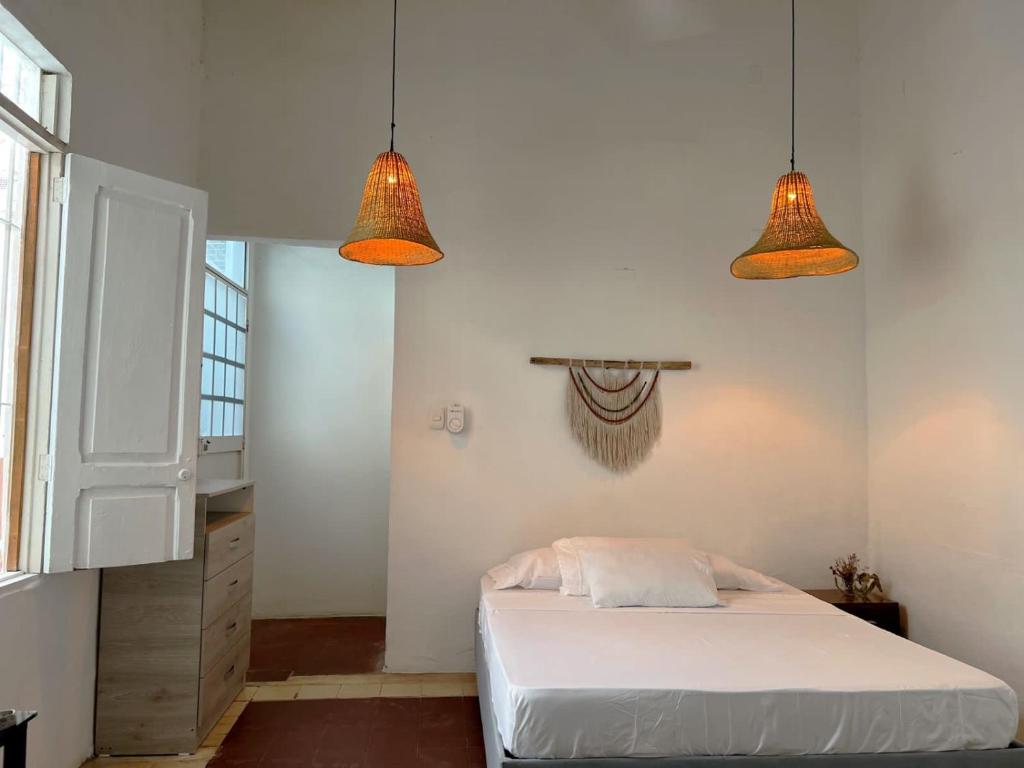 Llit o llits en una habitació de Hermosa y céntrica casa Altamar