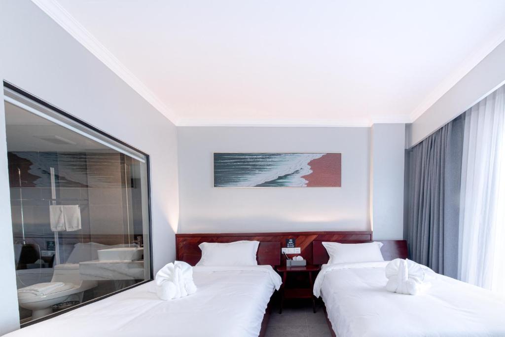 Postel nebo postele na pokoji v ubytování Solar Hotel