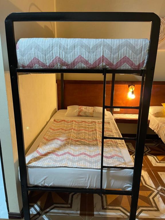 Postel nebo postele na pokoji v ubytování POSADA MIRADIA
