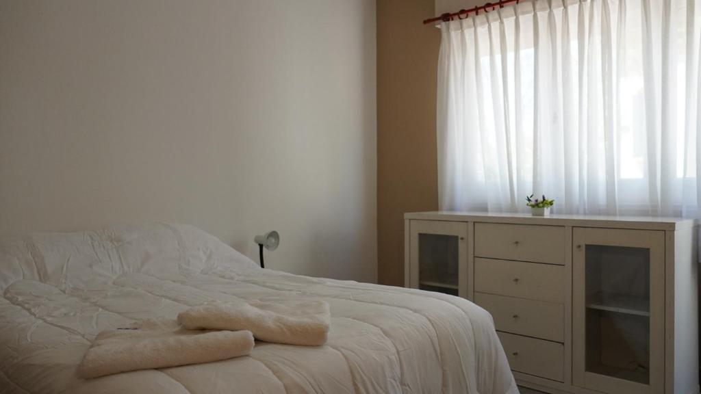 Postel nebo postele na pokoji v ubytování EL RELOJ