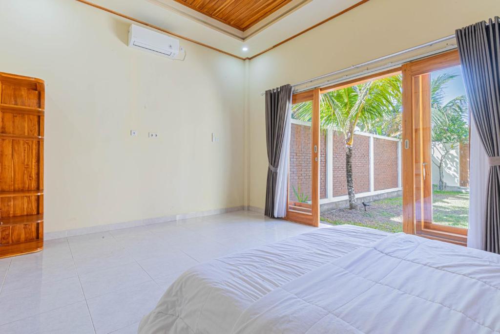 Fotografie z fotogalerie ubytování Sandz House v destinaci Jembrana