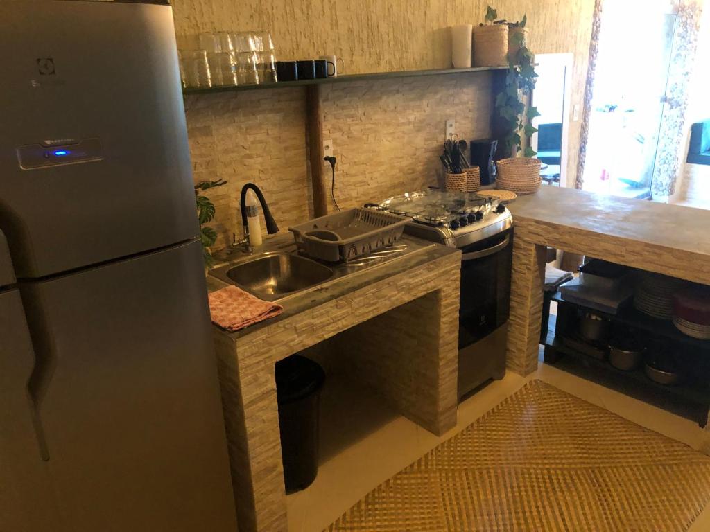 Kuchyň nebo kuchyňský kout v ubytování Casita Cumbuco