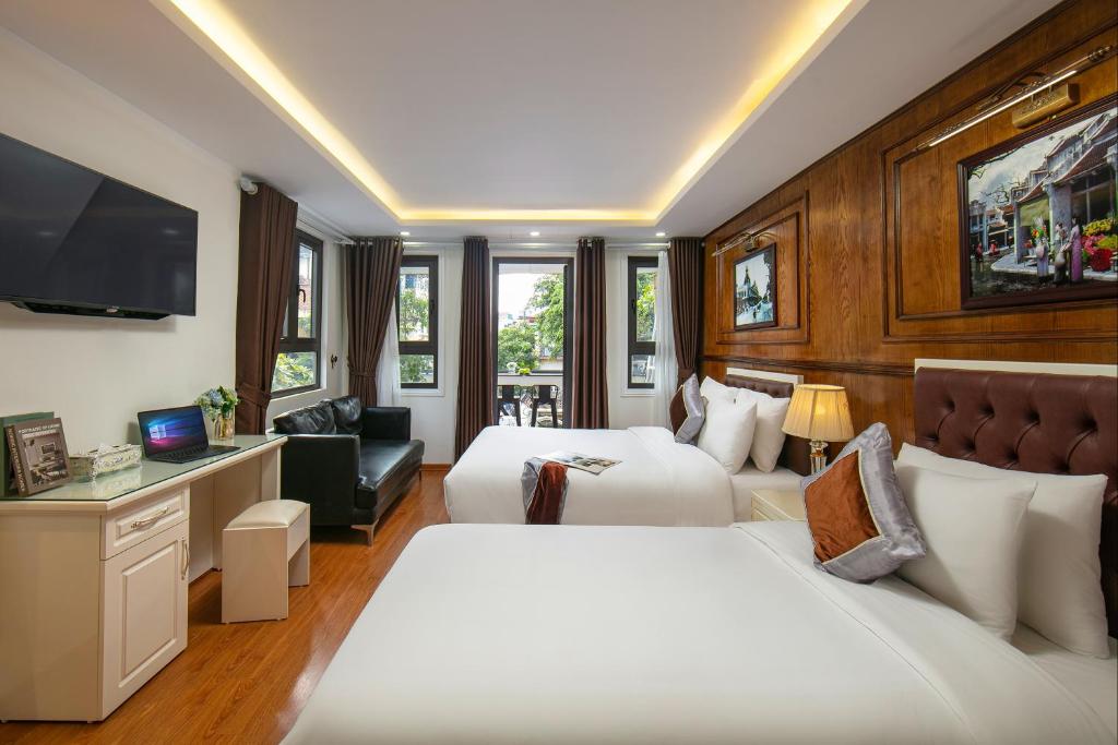 TV a/nebo společenská místnost v ubytování Tunger Grand Hotel