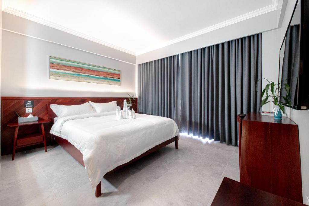 Postel nebo postele na pokoji v ubytování Solar Hotel