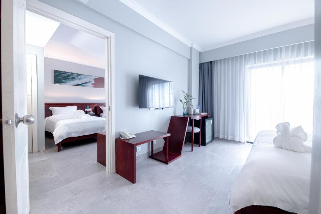 Postel nebo postele na pokoji v ubytování Solar Hotel