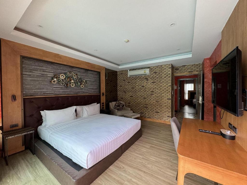 TV a/nebo společenská místnost v ubytování La Isla Pranburi Beach Resort