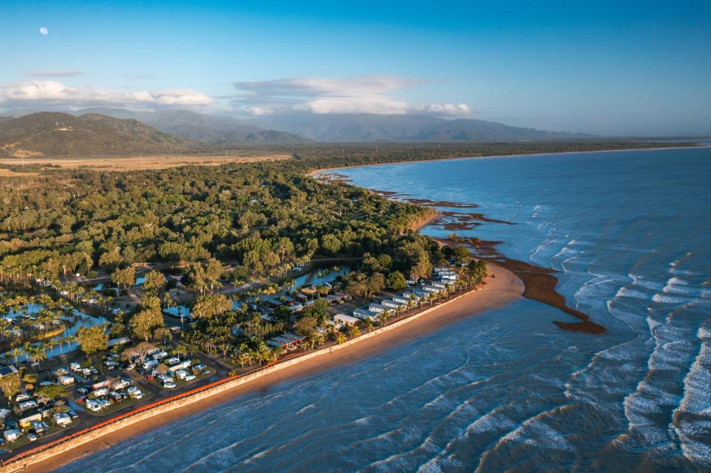 an aerial view of a resort on the beach at Tasman Holiday Parks - Rollingstone in Rollingstone